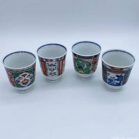 Four Arita Ko-Imari yunomi teacups front view