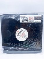 Front view of 12" vinyl in sleeve inside clear bag