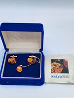 Full set in open presentation box with booklet visible