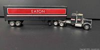 Full side view of tractor and trailer showing Eaton logo