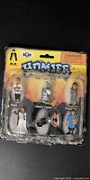 Full blister card front with six figurines and Homies logo