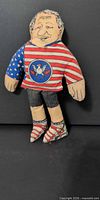 Front view of Kitty Hoots Bill Clinton satire doll standing