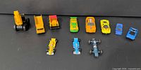 All 11 toy vehicles grouped
