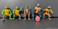 All five standing figures plus Krang brain arranged for overview