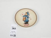 Front view of the 1983 Goebel Hummel Postman plate showing full design and year
