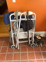 walker, canes, chair visible folded together