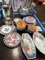 Group shot of all porcelain and glass items on table