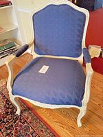 Front view showing overall chair design and upholstery