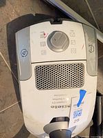 Top view of Miele Compact C1 canister showing controls and wear