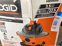 Retail box showing Ridgid branding, capacity and model