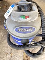 Top view showing Shop-Vac logo, power switch and hose
