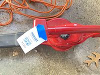 Toro red leaf blower with MaxSold tag