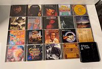 Front covers of first twenty CDs including Johnny Cash box