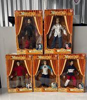 Front view of five boxed NSYNC marionette dolls stacked