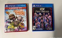 Front covers of LittleBigPlanet 3 and AEW Fight Forever PS4 cases