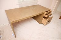 Overall view of brown laminate desk