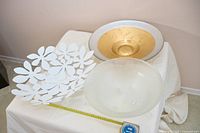 All three bowls with tape measure for scale