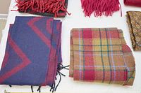 Close-up of two lower scarves