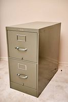 Front view of olive green 2-drawer steel filing cabinet