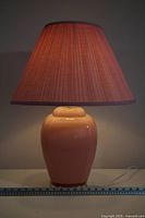 Front view of ceramic lamp with shade