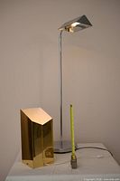 Both lamps standing with tape measure for scale