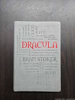 Front cover with embossed text and red Dracula title