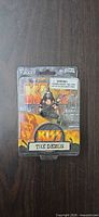Front view of sealed KISS The Demon action figure on card