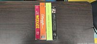 Four VHS tape spines: The Real Weegee, O'Keeffe, Cherry Valley Arts Festival 1998, Annie Leibovitz: Celebrity Photographer