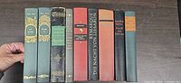 Full row of nine German hardcover books