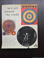 Front cover showing title and artwork, tear bottom edge