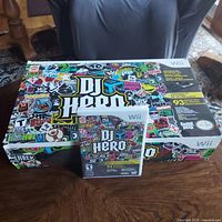 DJ Hero retail box front with sealed Wii game case