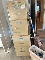 Stacked view of both metal 2-drawer file cabinets