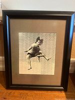 Front view of framed black-and-white photograph