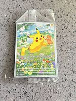 Front view of sealed Pikachu Promo 088 card showing artwork, HP, attacks