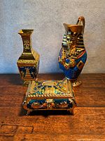 Group shot of pharaoh jug, Iraq vase and trinket box