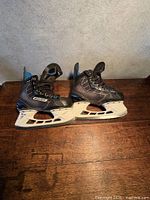 Full view of both skates side by side showing overall condition and holders