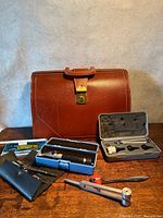 Overall lot showing briefcase and medical tools