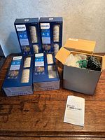 Four Philips LED Micro Lights boxes, open box with solar lights and stake