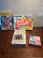 All four boxed games on table