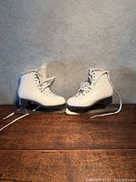 Full view of both skates showing color, style and condition