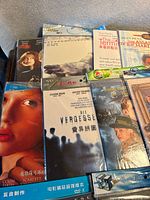 Group of boxed DVDs including Girl with a Pearl Earring, The Forgotten and others