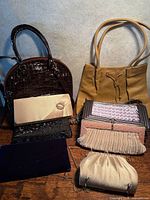Group overview showing eight handbags and clutches