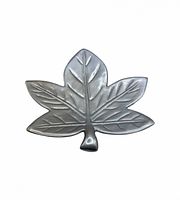 Top view of maple leaf aluminum dish showing design and condition