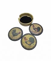 Front view showing three rooster coasters and holder
