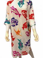 Front view of nightgown showing fish print and sleeve length