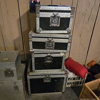 Stack of four ARRI-III 400 cases against wall