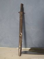 Full view of bayonet inside scabbard