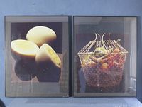 Both framed prints side by side showing subjects and frames