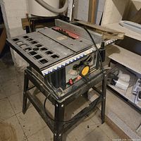 Full view of Ryobi table saw on stand