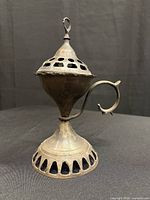 Side view showing full burner with lid closed